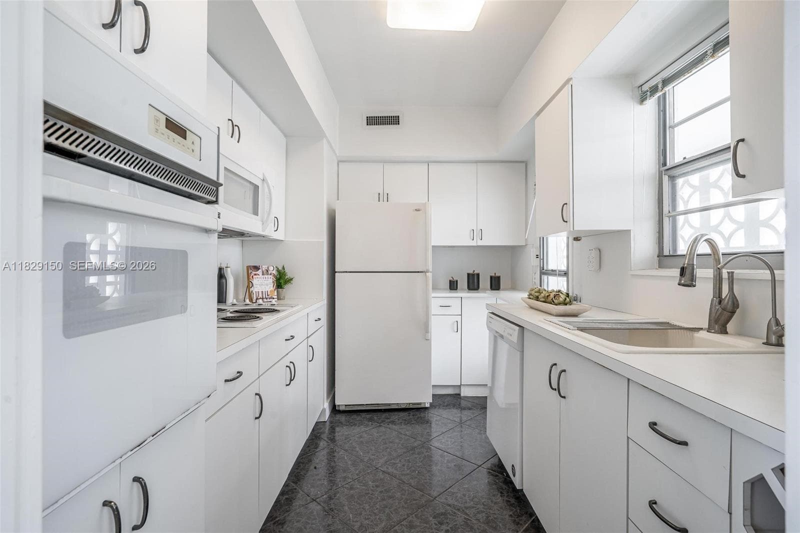 9101 E Bay Harbor Dr 705 photo 24