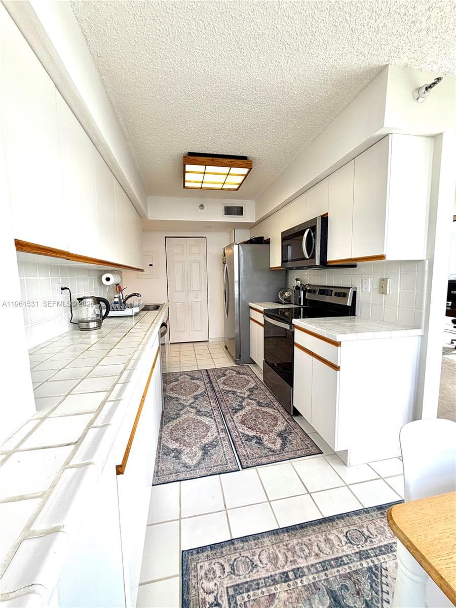 3530 Mystic Pointe Dr 2605 photo 11