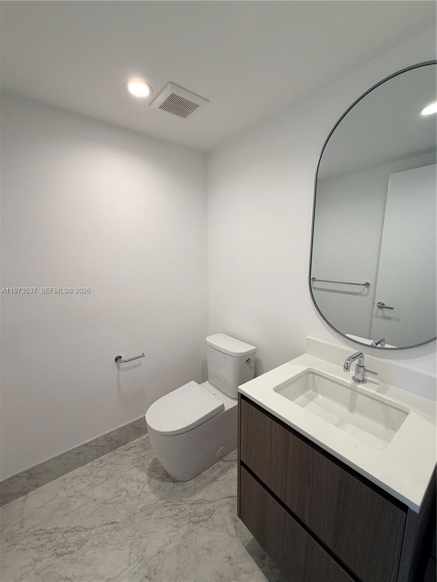 9221 E Bay Harbor Dr 309 photo 14