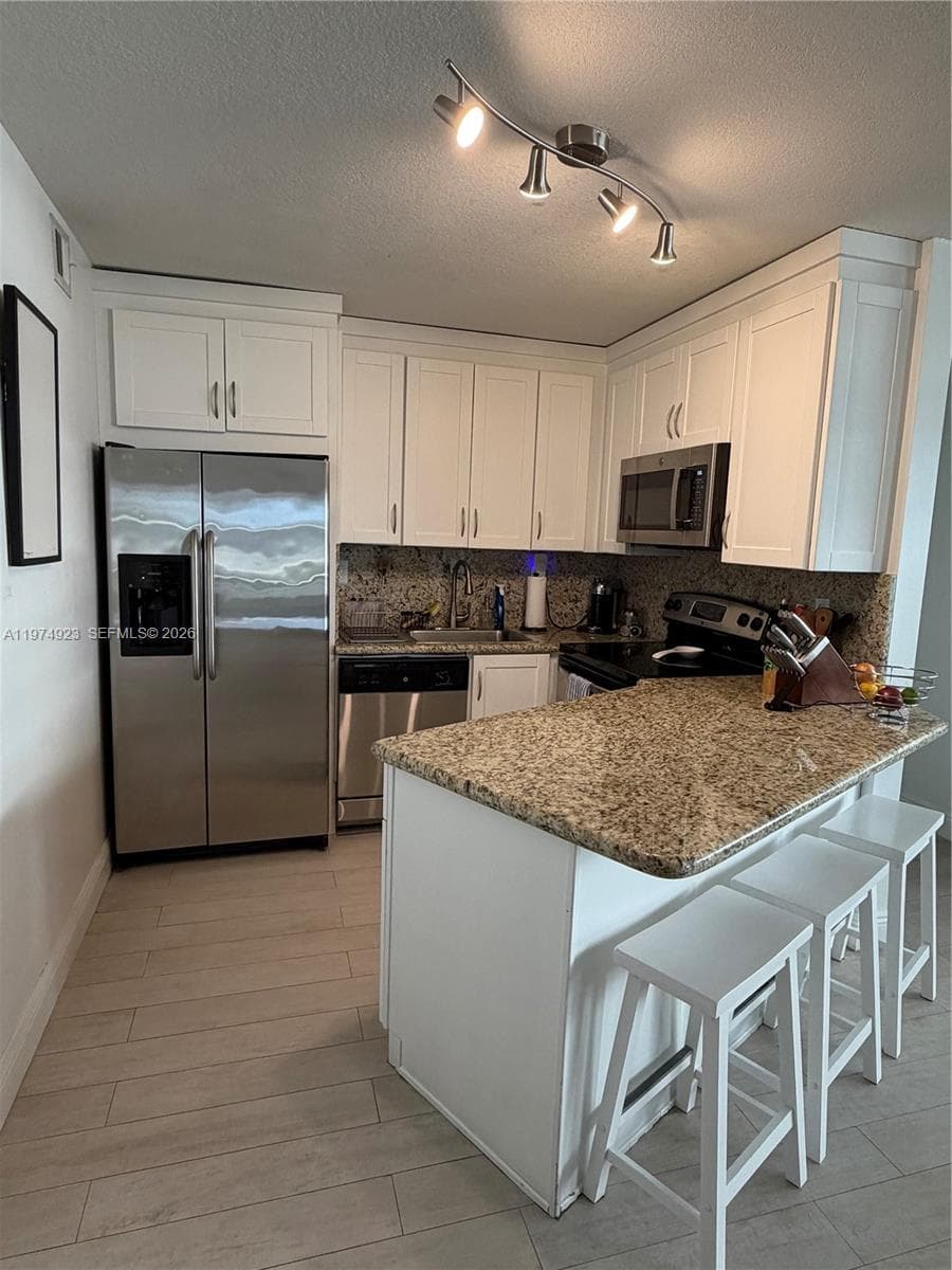 5845 Collins Ave 106 photo 2