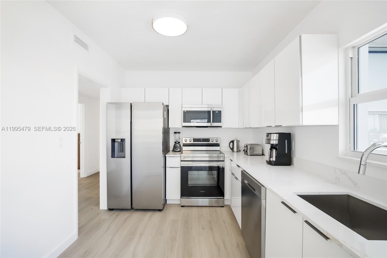 9881 E Bay Harbor Dr 401 photo 5
