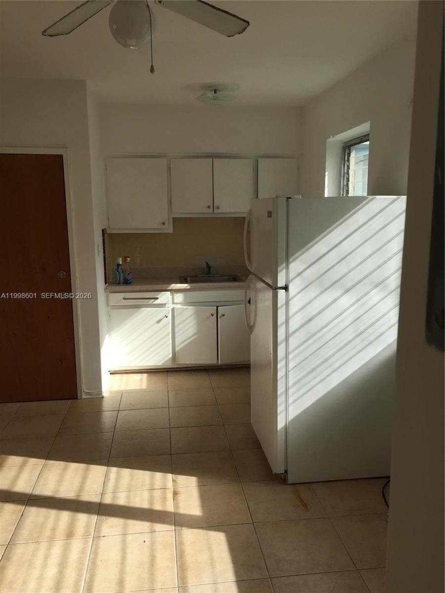 4740 Pine Tree Dr 26 photo 7