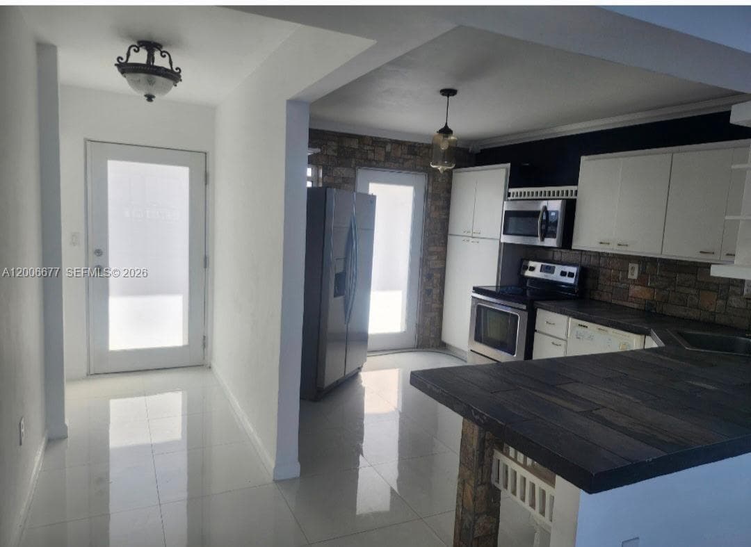 1175 NE Miami Gardens Dr 703 photo 23