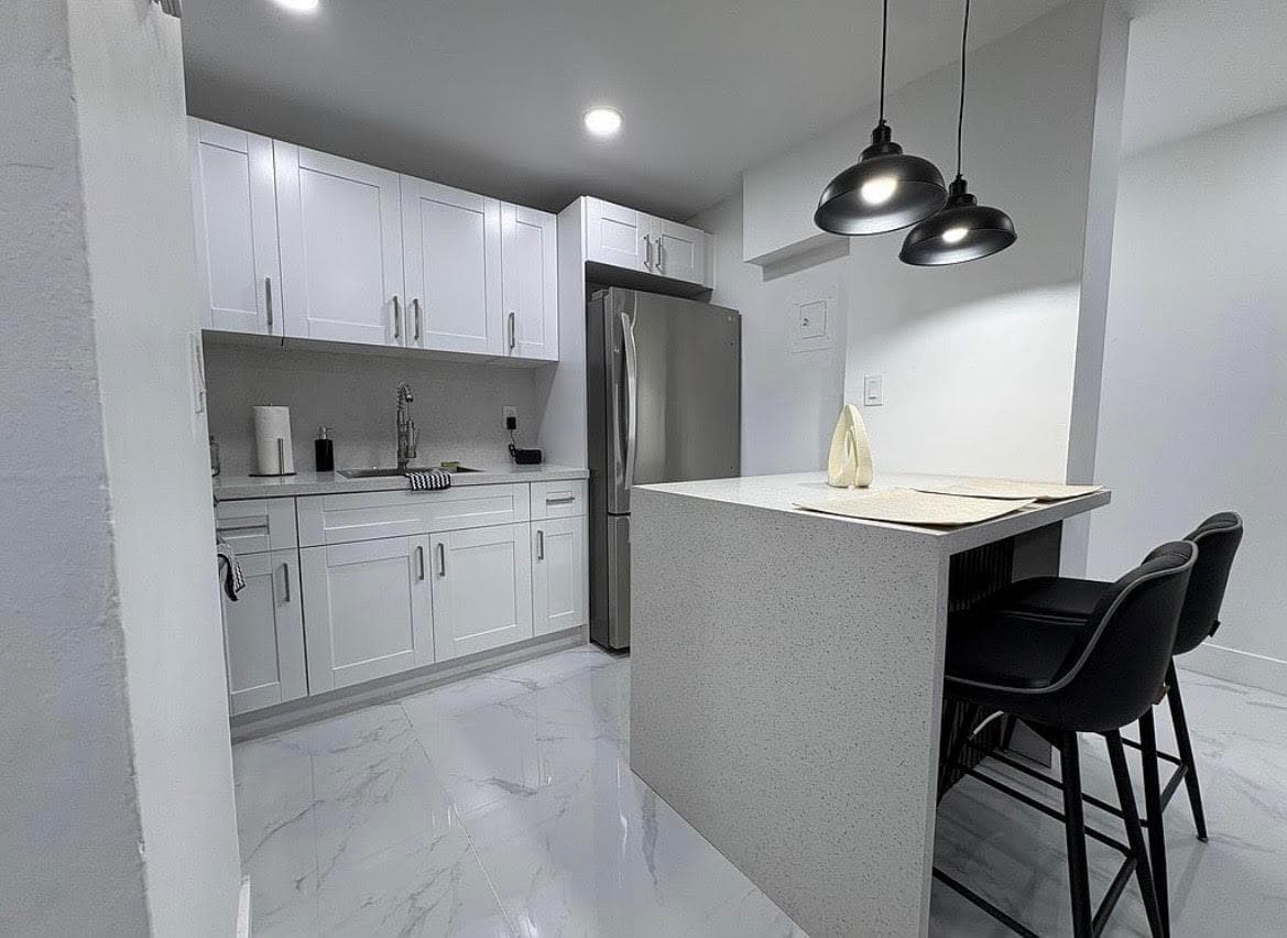 4265 NW South Tamiami Canal Drive 1-211 photo 1