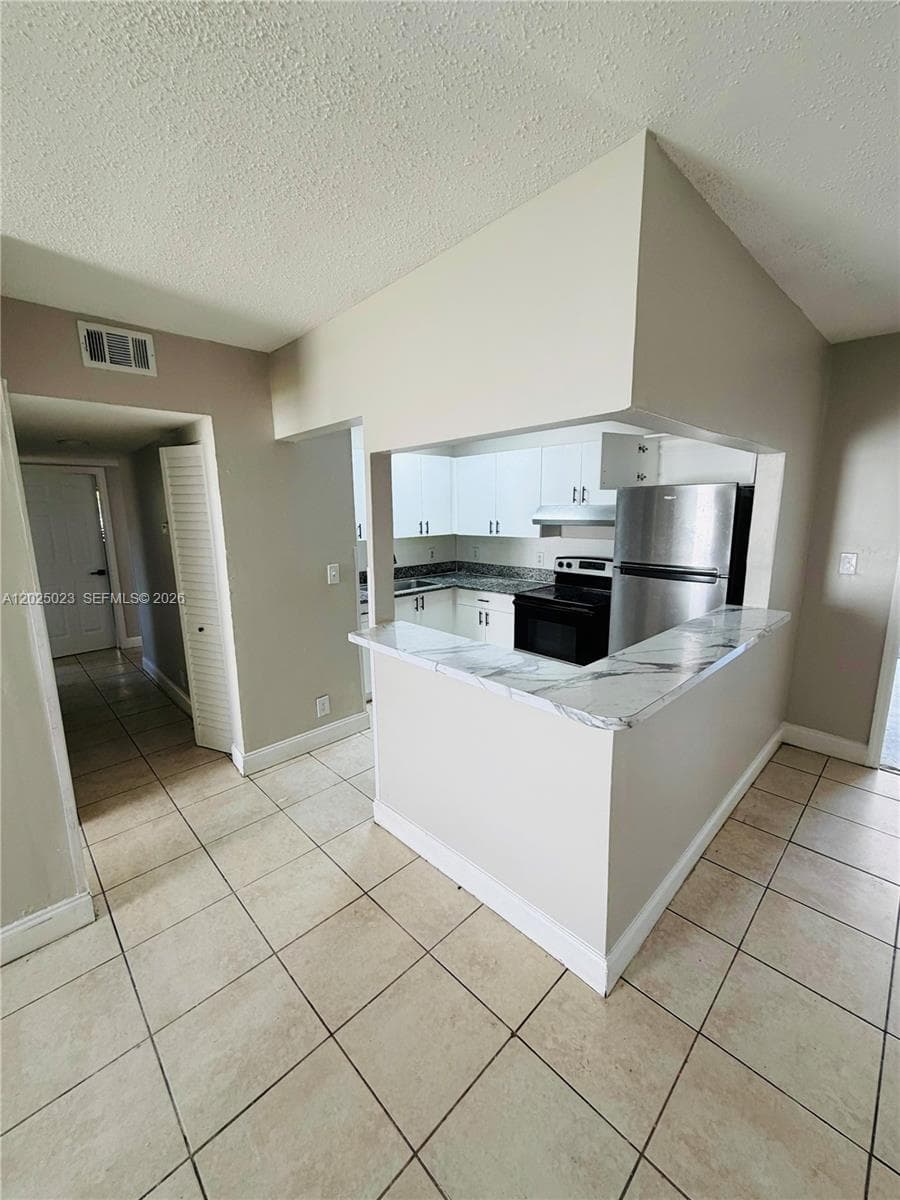 331 NW 42ND CT 101 photo 1