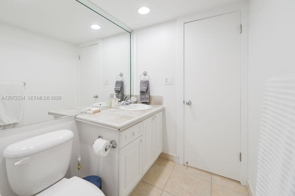 1121 Crandon Blvd D206 photo 16