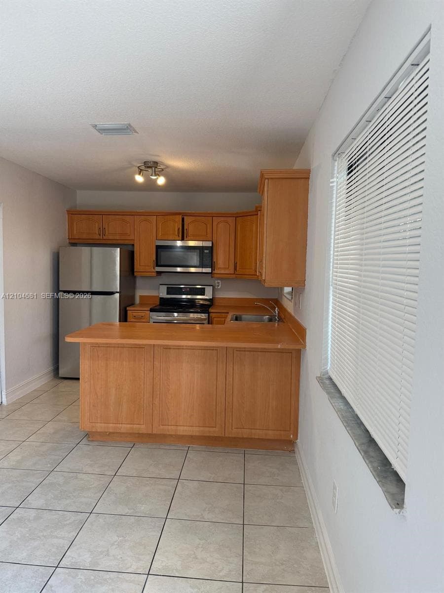 3715 NW 23rd Ct 3715 photo 4