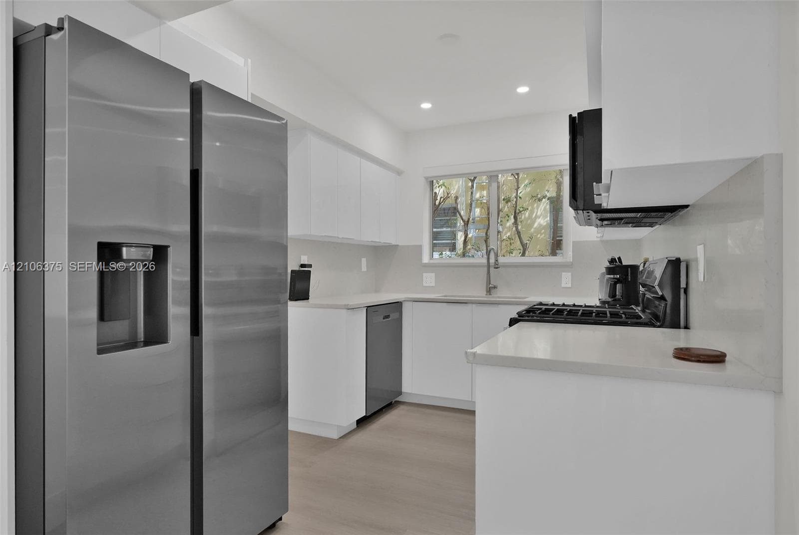 4800 Pine Tree Dr 101 photo 5