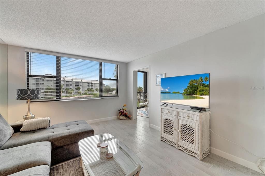 5855 MIDNIGHT PASS ROAD 314 photo 16