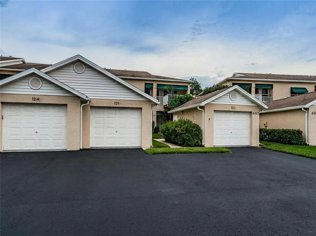 6363 99TH WAY N 12I photo 1