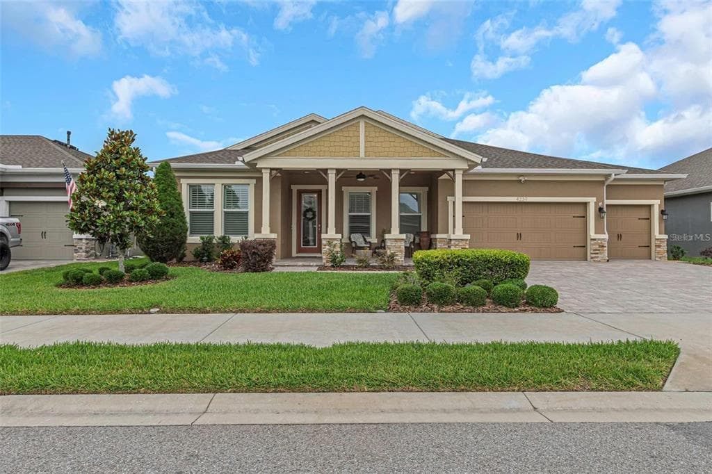 4239 WOODLAND RETREAT BOULEVARD photo 1