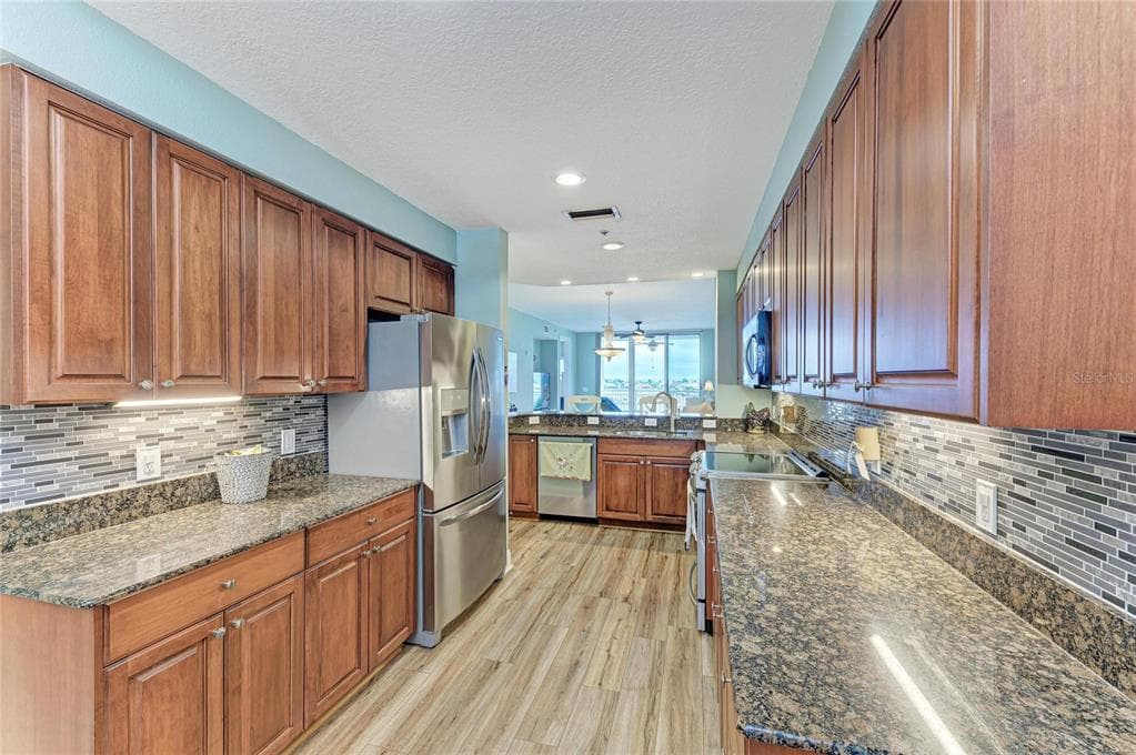 610 RIVIERA DUNES WAY 406 photo 24