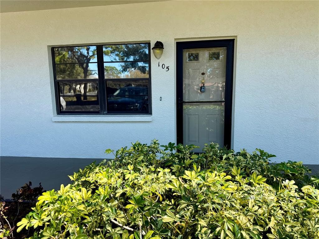 6070 80TH STREET N 105 photo 1