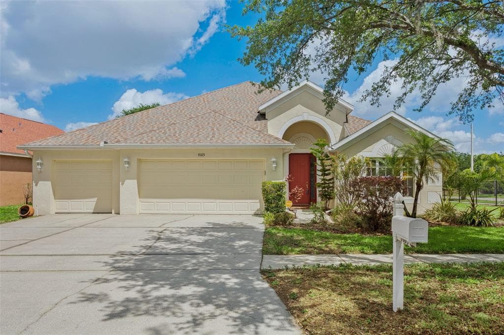 9103 PINEBREEZE DRIVE photo 1