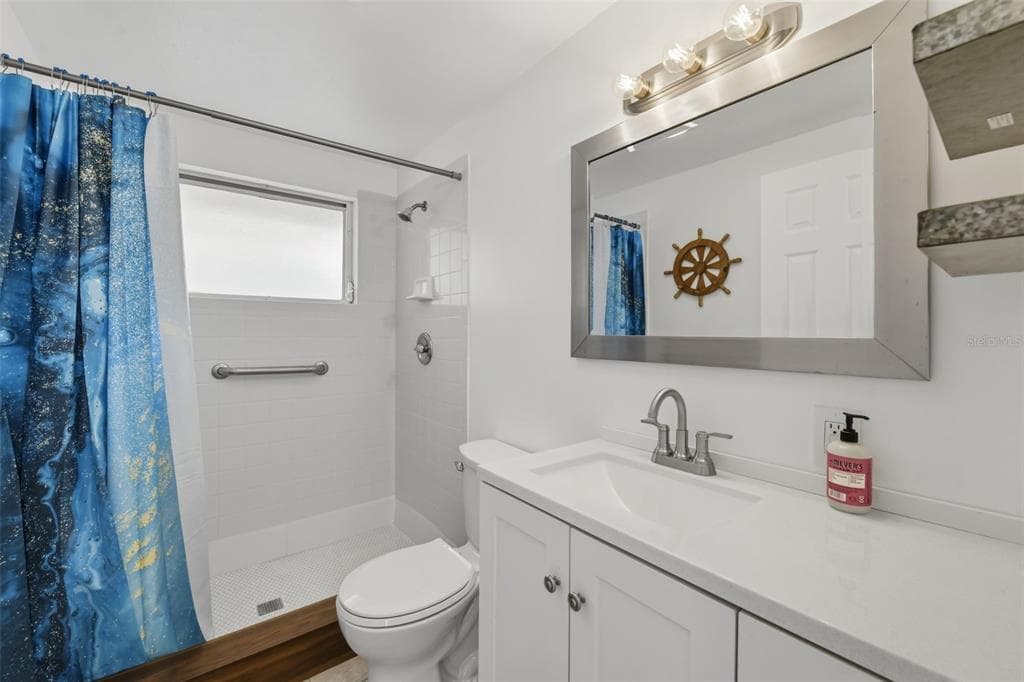 8456 MIDNIGHT PASS ROAD photo 19