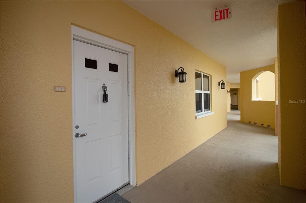 615 RIVIERA DUNES WAY 402 photo 2