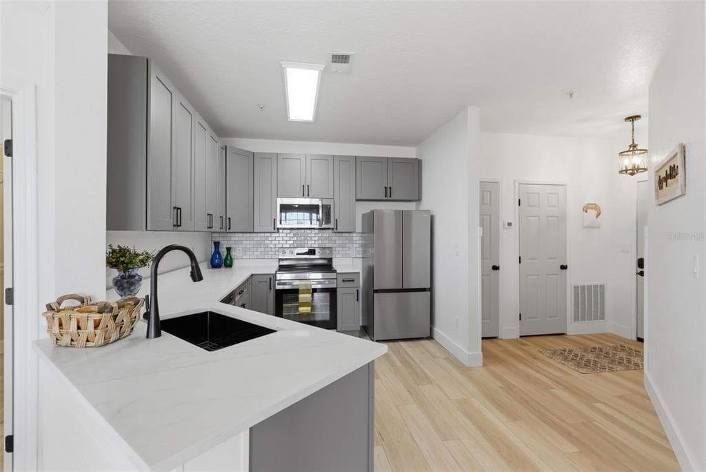 4323 BAYSIDE VILLAGE DRIVE 312 photo 2