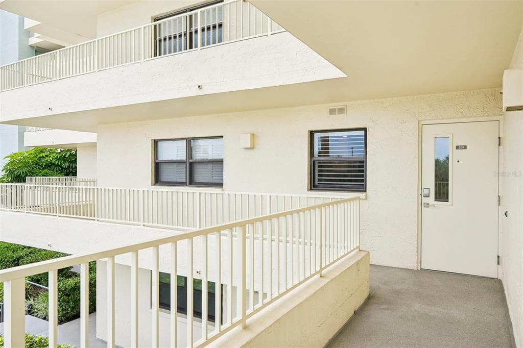 5760 MIDNIGHT PASS ROAD #209D photo 2