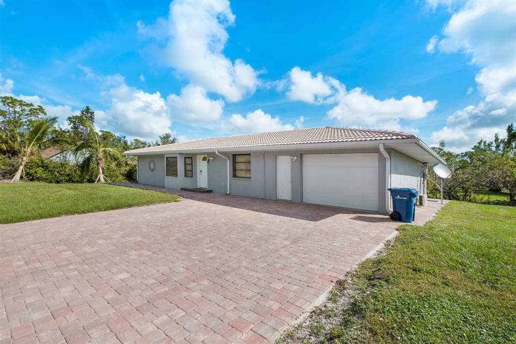 9080 CALOOSA DRIVE photo 2
