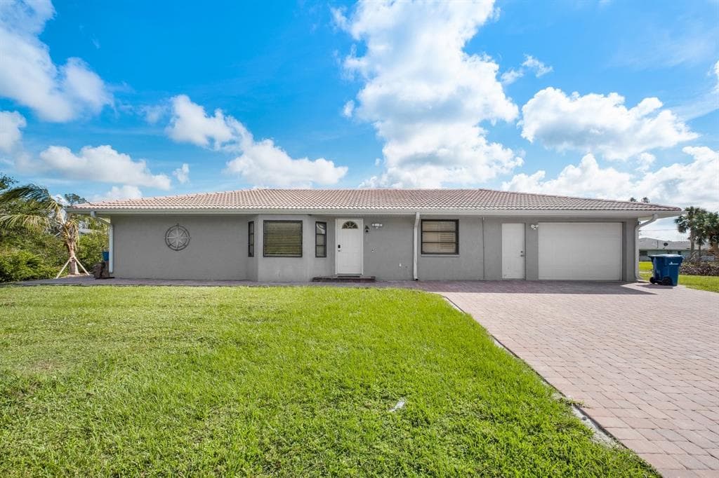 9080 CALOOSA DRIVE photo 1