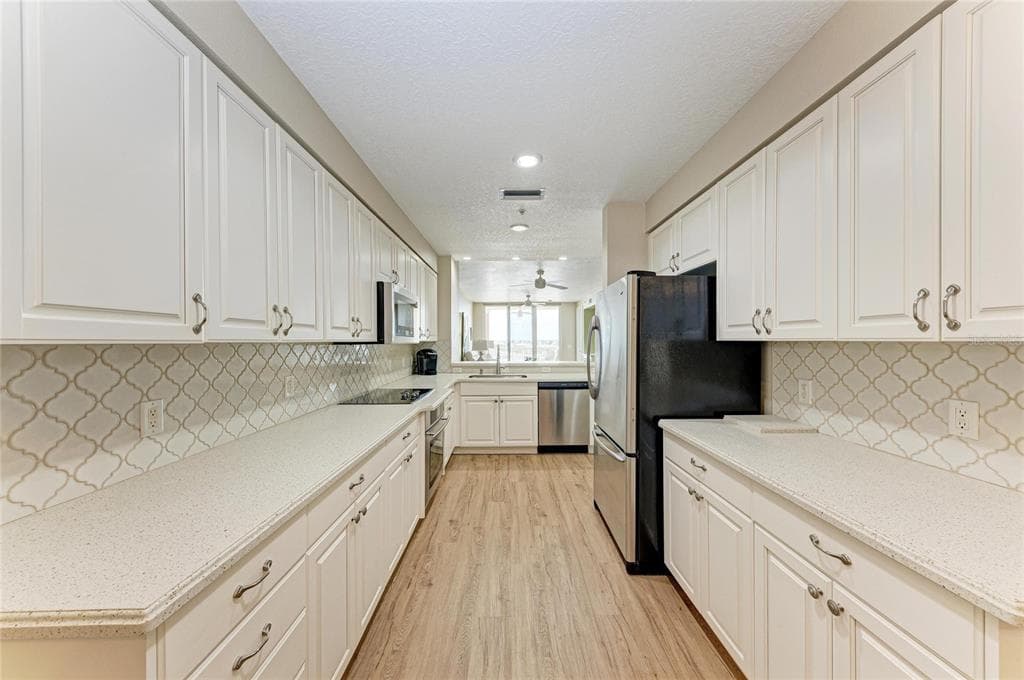 610 RIVIERA DUNES WAY 404 photo 18