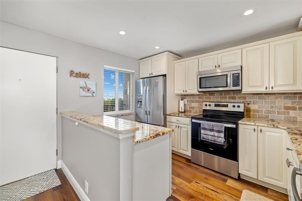8911 MIDNIGHT PASS ROAD 409 photo 16