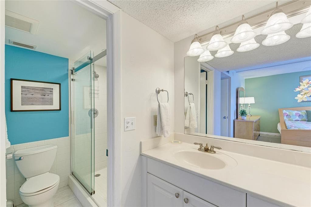 6157 MIDNIGHT PASS ROAD E12 photo 24