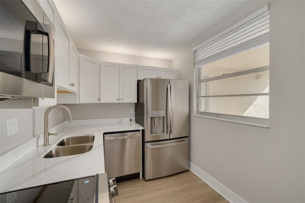 7425 BAY ISLAND DRIVE S 107 photo 24