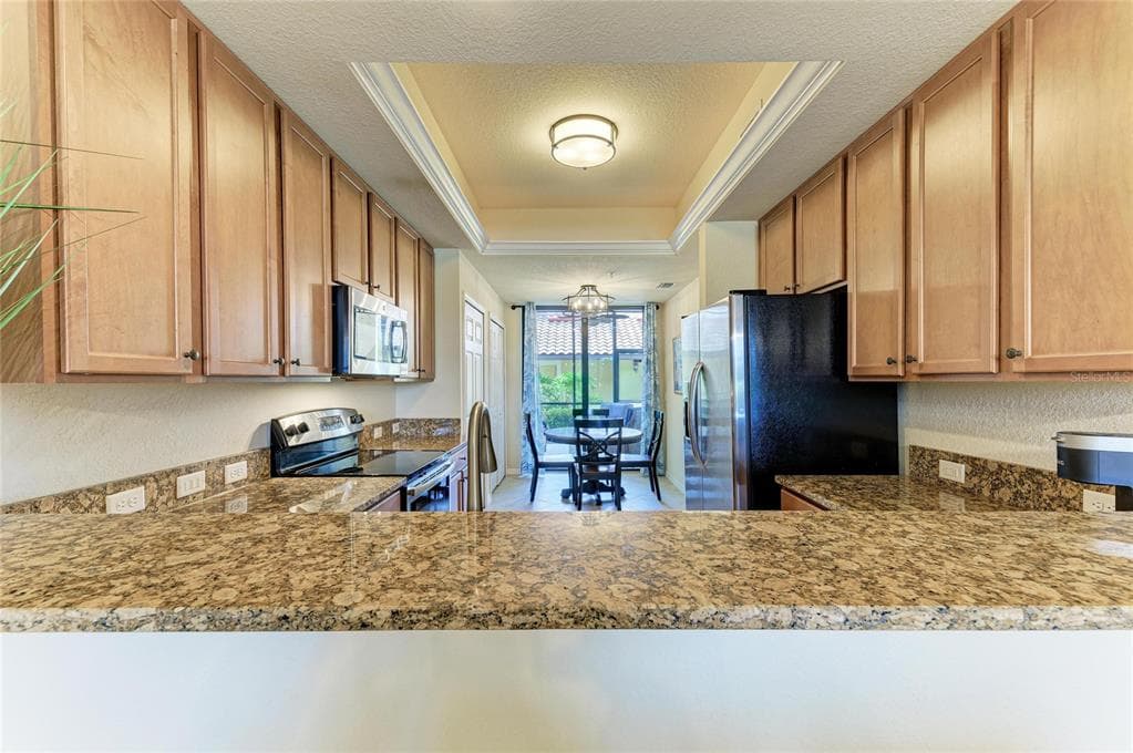 7305 RIVER HAMMOCK DRIVE 102 photo 20