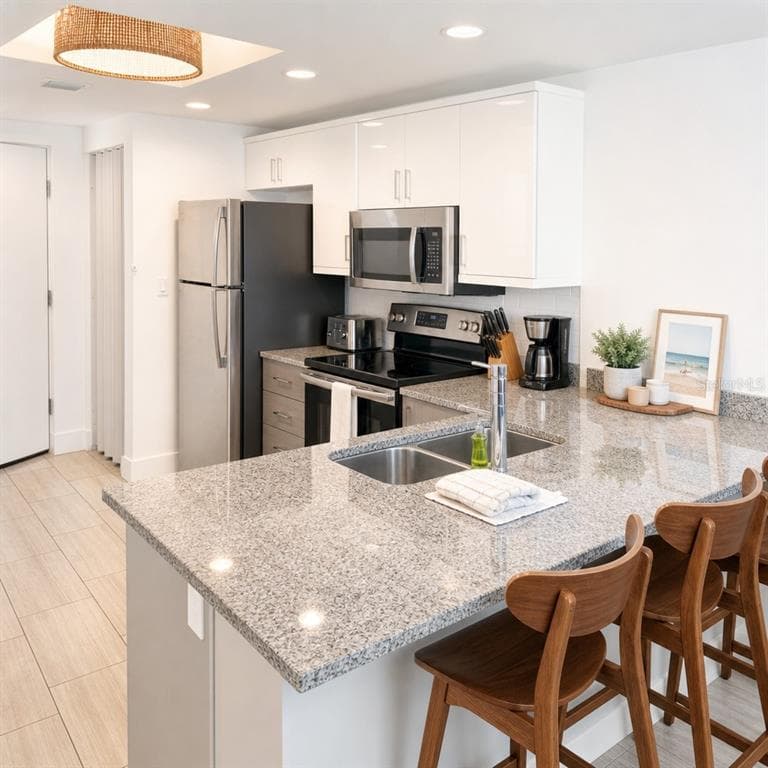 10091 GULF BOULEVARD #203E 4