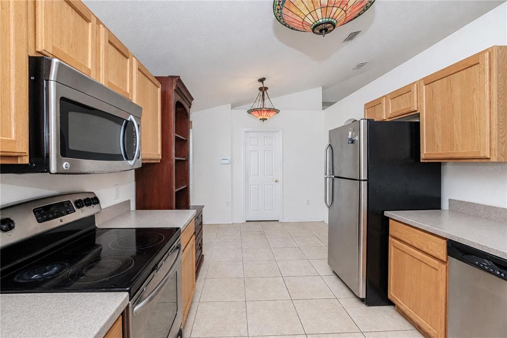 2639 SUNCOAST LAKES BOULEVARD photo 2