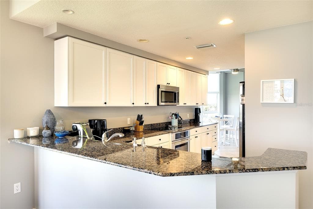 611 RIVIERA DUNES WAY 308 photo 19
