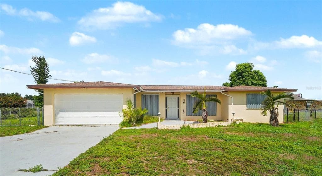 562 E TARPON BOULEVARD NW photo 1