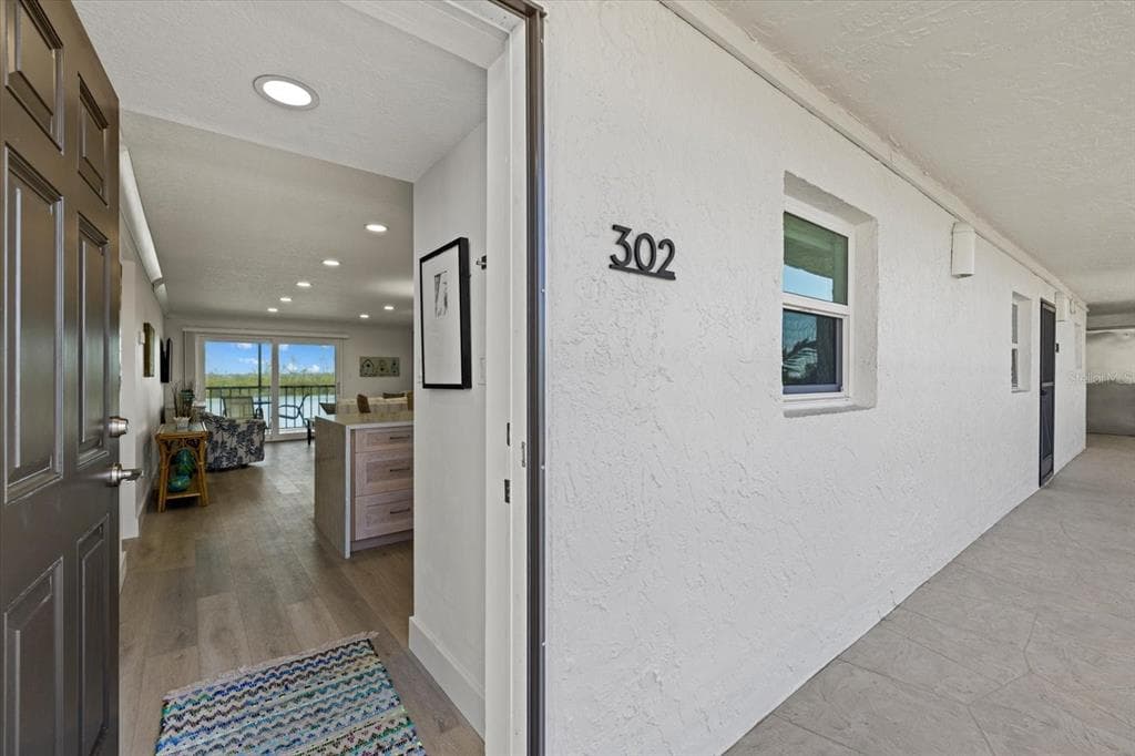 9393 MIDNIGHT PASS ROAD 302 photo 24