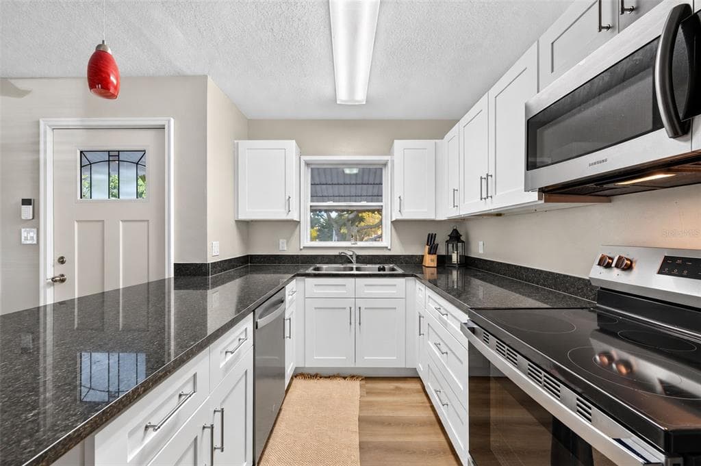 9398 SUN ISLE DRIVE NE photo 9