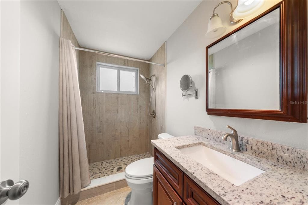 6025 SHORE BOULEVARD S 107 photo 25