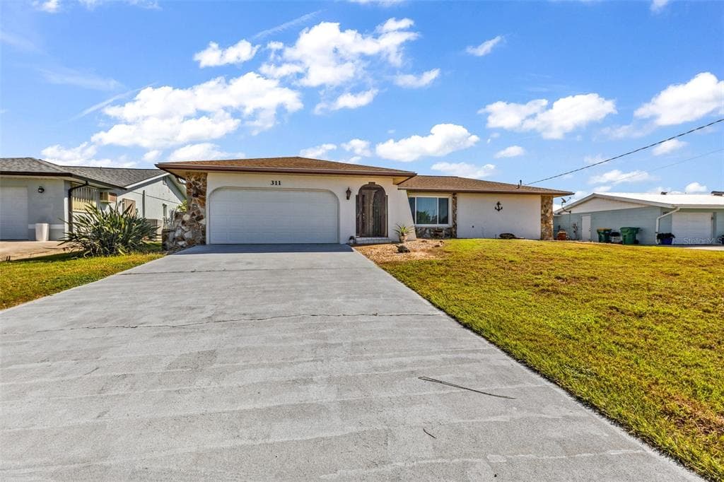 311 W TARPON BOULEVARD NW photo 1