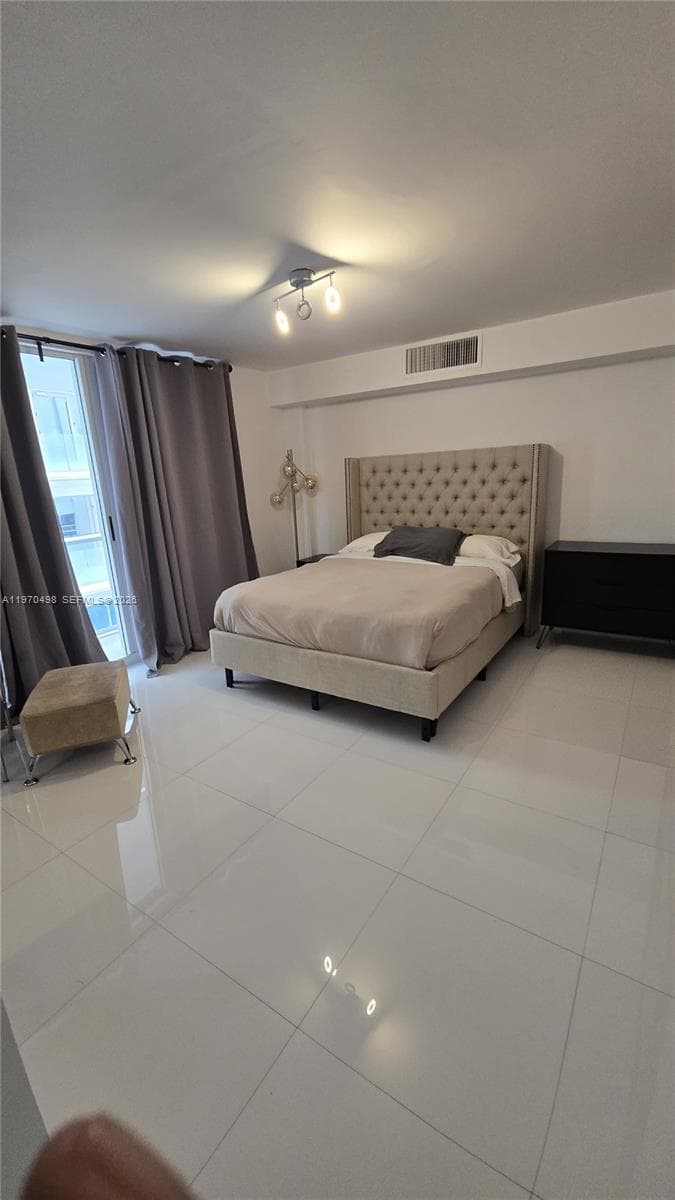 9195 Collins Ave 406 photo 1