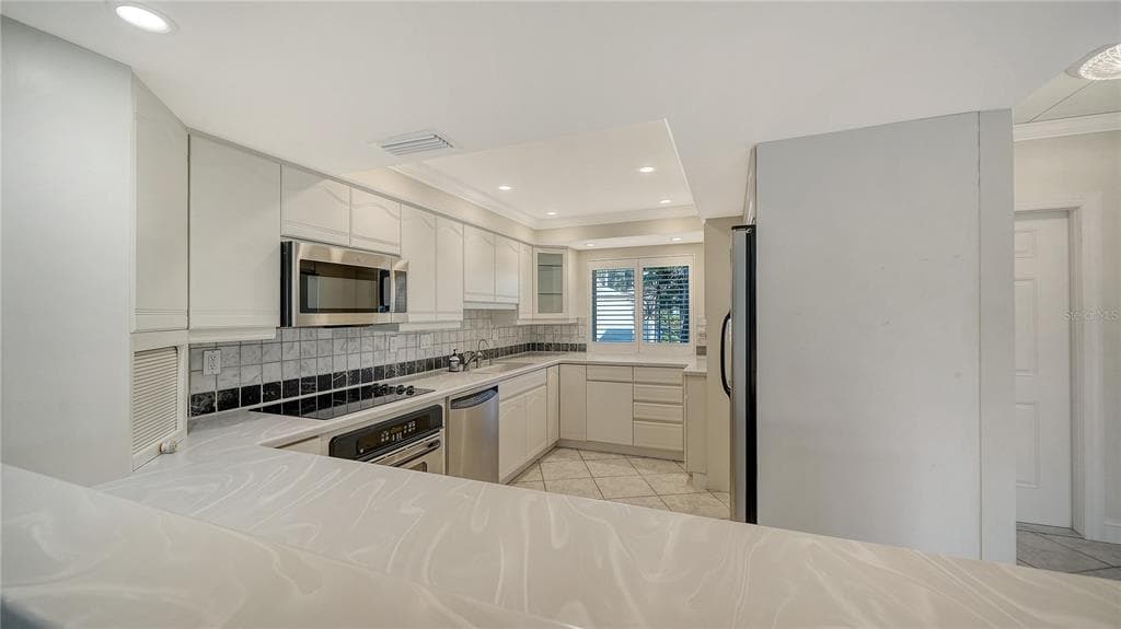 4835 GULF OF MEXICO DRIVE 106 photo 7