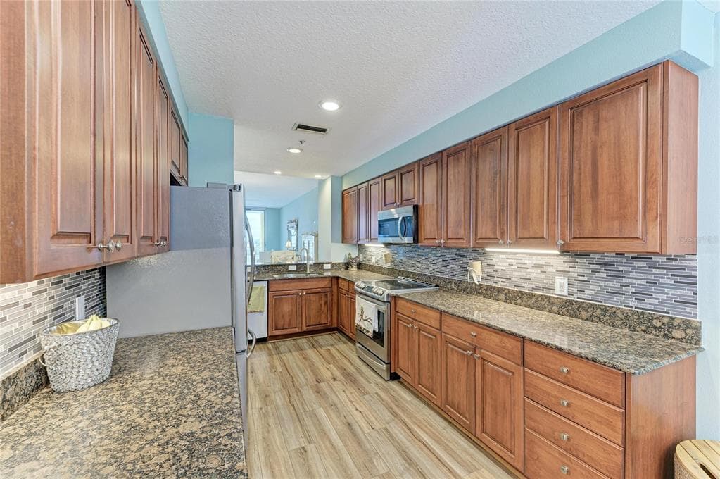 610 RIVIERA DUNES WAY 406 photo 25