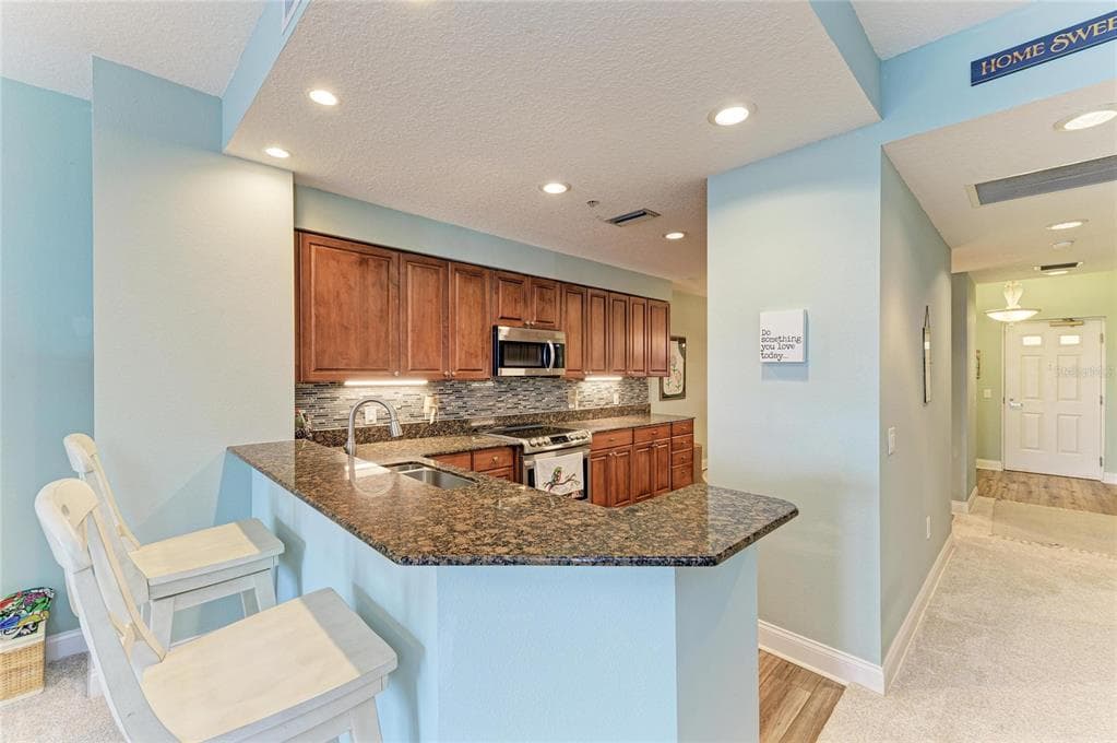 610 RIVIERA DUNES WAY 406 photo 21