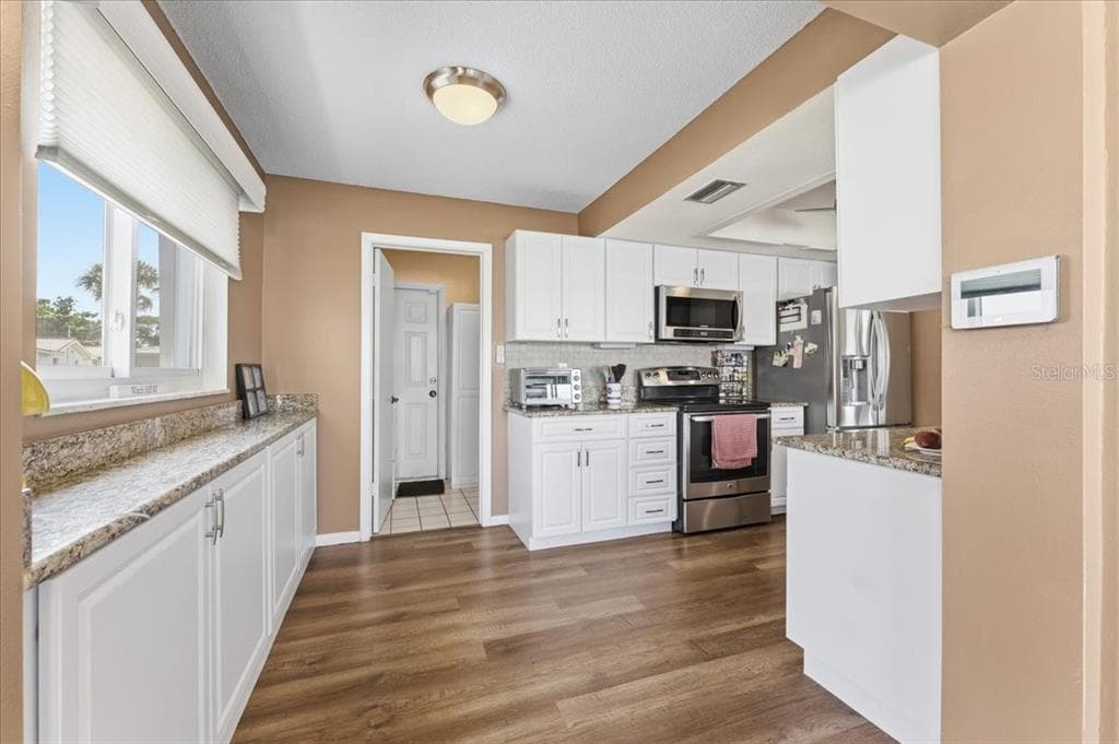 9875 MAINLANDS BOULEVARD W photo 22