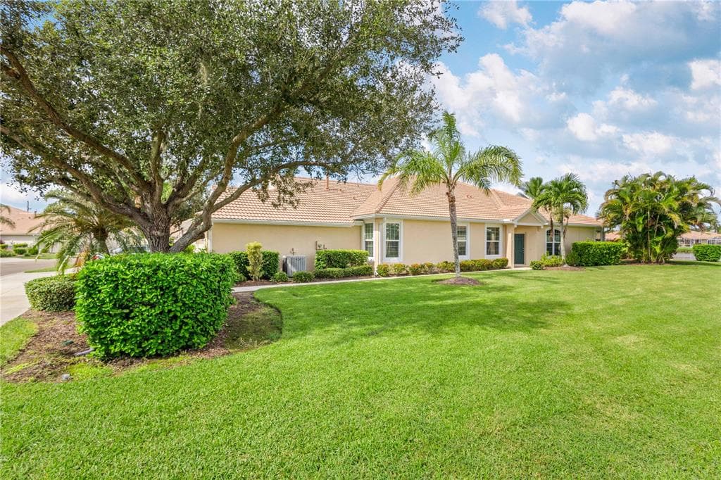 5064 WHISPERING OAKS DRIVE photo 1